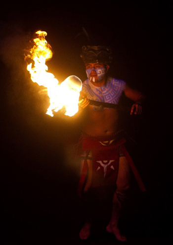 A[-]Mexican[-]wearing[-]a[-]pre-Hispanic[-]Mayan[-]costume[-]plays[-]with[-]a[-]ball[-]of[-]fire[-]in[-]a[-]recreation[-]at[-]Xcaret[-]Park[-]in[-]Playa[-]del[-]Carmen[-]in[-]Quintana[-]Roo[-]state,[-]Mexico[-]on[-]December[-]18,[-]2012,[-]during[-]preparations[-]for[-]the[-]celebration[-]of[-]the[-]end[-]of[-]the[-]Maya[-]Long[-]Count[-]Calendar[-]--Baktun[-]13--[-]and[-]the[-]beginnig[-]of[-]a[-]new[-]era.[-]Mexico[-]is[-]one[-]of[-]five[-]countries[-]preparing[-]to[-]observe[-]the[-]date[-]on[-]December[-]21,[-]which[-]marks[-]the[-]end[-]of[-]a[-]more[-]than[-]5,000-year[-]era,[-]according[-]to[-]the[-]Mayan[-]"Long[-]Count"[-]calendar,[-]which[-]began[-]in[-]3114[-]BC